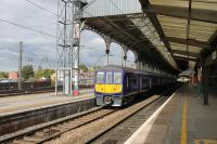 The new order at Preston station in 2015. <I>Northern Electric</I> 319383 draws in to Platform 2 for a very quick turnaround prior to returning to Lime St via St. Helens Central. The four car EMUs have replaced two car 156 Sprinters on these services, which in turn are doubling the size of trains on other Northern routes. <br><br>[Mark Bartlett 13/10/2015]