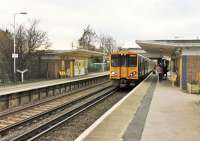 When the West Kirby line was electrified in the 1930s the stations were rebuilt with distinctive <I>art deco</I> buildings and canopies that survive to this day. 507023 calls at Meols on a West Kirby to Liverpool service on 16th November 2015. The 35+ year old 507/508 EMUs are now in their last years as tenders have been invited for a replacement Merseyrail fleet.<br><br>[Mark Bartlett 16/11/2015]