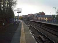 Looking south west on the up side showing the lengthy platforms that exist at Pontefract Baghill station, with the subway ramped access visible to either side. The platforms reflect the years when it was a main line station - and could be again by extending most Midland Main Line services to York, rather than have a two coach train shuttling between there and Sheffield.<br><br>[David Pesterfield 13/11/2015]