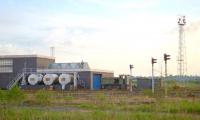 The yard at Kincardine power station in 1997 with a Ruston diesel locomotive standing outside the shed. [Ref query 5250]<br><br>[Ewan Crawford 18/05/1997]