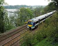 Incomplete liveried 170450 heads east past Silversands Bay in 2005.<br><br>[Ewan Crawford 22/04/2005]