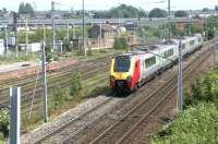 A Virgin Voyager heads south past a very quiet Upperby in August 2003, shortly after calling at Carlisle.<br><br>[John Furnevel 29/08/2003]