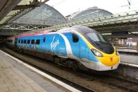 390013 the <I>Penguilino</I> has just arrived at Manchester Piccadilly with Virgin's Christmas offering for 2015.<br><br>[John McIntyre 10/12/2015]