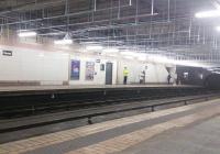 Glasgow Subway modernisation is nearing its end with only Govan station not fully made over. Here it is at half-way stage in December 2015 with only glimpses of the once ubiquitous 70s beige tiling. Note also the ceiling suspenders with nothing attached yet.<br><br>[David Panton 12/12/2015]