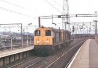 In nose to nose tandem as usual, two Class 20s pass through Bescot station in 1979, signalled for the marshalling yards. Both locos continued in BR service for another decade or so and 20063 then worked in France for CFD for several years. It was later repatriated and is now preserved on the Battlefield line but 20071 was scrapped after withdrawal.<br><br>[Mark Bartlett 18/04/1979]