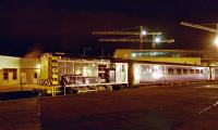 08 with sleeper stock at Inverness in the Far North platforms during February of 2002. In the background is the Eastgate development, partly on the site of the goods yard.<br><br>[Ewan Crawford /02/2002]