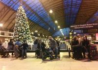 Pre-dawn on Saturday 12 December 2015 - but there are already excitable children around a festive-looking Queen Street station.<br><br>[David Panton 12/12/2015]