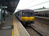 Happy to be leaving - 365502 certainly has that 'bugs in its teeth' look as it awaits its 10.30 departure time for King's Cross in platform 7 at Cambridge on 5 December.<br><br>[Ken Strachan 05/12/2015]