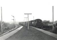 BR standard tank 80055 bringing a train into the recently extended platform at the north end of Cathcart station on 2 December 1960. [See image 49118]  <br><br>[G H Robin collection by courtesy of the Mitchell Library, Glasgow 02/12/1960]