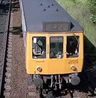 107438 northbound approaching the former Strathbungo station in 1987. Newspaper, BR jacket and, I suspect, lunch can be seen.<br><br>[Ewan Crawford //1987]