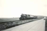 Ivatt 2-6-0 46460 passing Fraserburgh golf course on 7 August 1953 with a train from St Combs. <br><br>[G H Robin collection by courtesy of the Mitchell Library, Glasgow 07/08/1953]