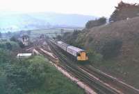 A Swindon Inter City Class 123 takes the Hope Valley route through Chinley North Junction in 1978. These sets had been made redundant on the Western Region the previous year and were transferred to Hull Botanic Gardens to work turn about with the similar Trans-Pennine sets. Final withdrawal and scrapping came in 1984.<br><br>[Mark Bartlett //1978]