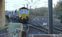 Freightliner class 66 No 66515 heads 6G10, a rare coal move from Killoch direct to Longannet on 19 November. Having run round in the sidings, it will now head to Longannet via Kilwinning.<br><br>[Ken Browne 19/11/2015]