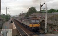 47701 'St Andrew' approaches the level crossing at Blair Atholl with a southbound train in 1990, view from the signalbox.<br><br>[Ewan Crawford //]