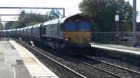 DBS class 66 No 66060 works 6G06 Hunterston - Longannet loaded hoppers through the station<br><br>[Ken Browne 29/09/2015]