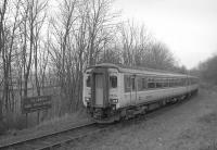 156424 nears Oxenholme with a Windermere - Manchester Airport service in January 1996.<br><br>[Bill Roberton /01/1996]