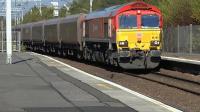 DBS class 66 No 66185 works 4J06 Longannet - Hunterston empty hoppers through Coatbridge Central station on 29th September 2015.<br><br>[Ken Browne 29/09/2015]