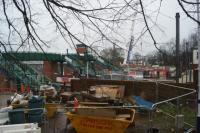 With all the steelwork in place for the new footbridge at Leyland, work moved to completing the lift shafts during the Christmas Day closure of the railway. This view is south west with the old footbridge steps on the right.<br><br>[John McIntyre 25/12/2015]