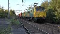 Freightliner class 86s No 86605+86638 work 4M11 from Coatbridge FLT - Crewe Basford Hall through Coatbridge Central station on 29th September 2015.<br><br>[Ken Browne 29/09/2015]