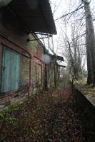 View south from the Kelso branch platform track with the locomotive shed to the left and platforms to the right. Three strange little roofs (which appear to be post closure additions) overhang the trackbed each above one of the non blocked up windows into the shed. To protect the window shutters perhaps? Does anyone know their purpose?<br><br>[Ewan Crawford 26/12/2015]