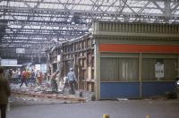 What looks to be a cafeteria being demolished on the western concourse of Waverley Station, sometime in the 1970s. A class 27 looks on.<br><br>[Bill Roberton //1970]