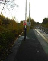 Looking north east along the down platform at Pontefract Baghill station on 13 November 2015, with the edge of a disused bay visible to the left. The bay was for a service that ran over Bondgate viaduct to join the Wakefield to Goole route by Monkhill station. The section of line leading from the S&K to the viaduct now forms part of the large Cott soft drinks plant site. [Ref query 36938]<br>
<br><br>[David Pesterfield 13/11/2015]