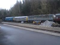 A line of diesel locos and an 0-6-0T steam loco seen stored at Bolton Abbey station in late December 2015. Nearest loco is the rather shabby looking original style liveried Brush Type 4 D1524, followed by a pair of Brush Type 2s with D5600 in original style livery and 31119 in rail blue livery. The steam loco could not be identified on this visit.     <br><br>[David Pesterfield 21/12/2015]