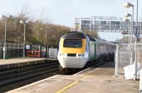 HST power car 43126, bedecked in <I>Bristol - European Green Capital 2015</I> bodyside vinyls, speeds through Didcot on 23rd December 2015 passing under the temporary footbridge. <br><br>[Peter Todd 23/12/2015]