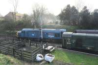 English Electric Type 3 No. 37324 <I>Clydebridge</I> (the former D6799) on a passenger train for Alton alongside 0-6-0 No. 08377 (D3462) at Alresford on the Mid-Hants Railway.<br><br>[Peter Todd 28/12/2015]