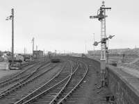 Looking east over Dundee Tay Bridge goods yard in 1985. The Central 'box is in the background.  Over the wall on the right, track renewals are taking place with the Dundee Tay Bridge West 'box already gone.  Soon this scene would be swept away to be replaced by a dual carriageway and supermarket.<br><br>[Bill Roberton //1985]