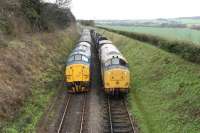 English Electric Type 3s meet at Ropley on the Mid-Hants Railway. Split headcode 37324 'Clydebridge' on passenger train duties passes 37901 in the siding on 28th December 2015. <br><br>[Peter Todd 28/12/2015]