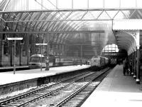 An unidentified <I>Deltic</I> warms up for the off at Kings Cross on 11 February 1980, alongside a recently arrived InterCity 125 HST. In the right background a class 31 is waiting to take out empty stock. <br><br>[John Furnevel 11/02/1980]