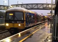 Still raining then.. the driver of the late running 15.57 to Great Malvern checks his train before leaving [see image 36098]. The destination indicator reads 'First Great Western' - not especially helpful.<br><br>[Ken Strachan 02/01/2016]