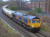 GBRF 66733 passes the closed Duddingston & Craigmillar Station with the North Blyth to Fort William Alcan train on 5 January 2016.<br><br>[Bill Roberton 05/01/2016]