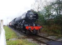 <h4><a href='/locations/T/Townsend_Fold'>Townsend Fold</a></h4><p><small><a href='/companies/E/East_Lancashire_Railway'>East Lancashire Railway</a></small></p><p>60103 <I>Flying Scotsman</I> hauls the first southbound ELR service of the day on 9 January 2016. The train is approaching Townsend Fold level crossing on one of its public test runs. [See recent news item]. Behind the grey pacific is the 'insurance policy' provided by 31466 (later replaced by a Black 5). 79/132</p><p>09/01/2016<br><small><a href='/contributors/John_McIntyre'>John McIntyre</a></small></p>