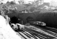 A lot of things have changed since I took this picture West of Newport station in 1987. The sidings on the left are still there, but rather overgrown; and sadly, you won't see 37's on steel trains any more.<br><br>[Ken Strachan /08/1987]