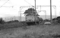 Glasgow Blue Train unit 041 approaching Cardross in 1974 with a Helensburgh to Bridgeton service.<br><br>[John McIntyre /04/1974]