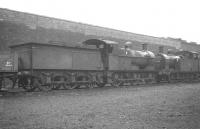 Looking refreshed after a shower of rain, Johnson 3F 0-6-0 43734 and <I>Jinty</I> 0-6-0T 47660 stand alongside Rose Grove shed, thought to be in early 1963. 43734 had been officially withdrawn the previous September and was eventually cut up by Messrs Campbell at Shieldhall in May 1963. 47660 continued to operate from here until March 1964 at which point it was transferred to Newton Heath. Rose Grove shed itself closed in August 1968.<br><br>[K A Gray 29//1963]