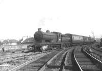 NB 4-4-0 No 62472 <I>Glen Nevis</I> passing Cowlairs West Junction on 26 June 1956 at the head of the 6.15pm Glasgow Queen Street - Kirkintilloch.   <br><br>[G H Robin collection by courtesy of the Mitchell Library, Glasgow 26/06/1956]