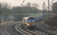 Winding through the reverse curves at the Oubeck Loops are DRS 66425 and 66301, double heading the <I>Tesco Express</I> to Mossend on 13th January 2016<br><br>[Mark Bartlett 13/01/2016]