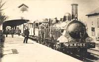 Highland Railway No 55 at Thurso. Postcard in my collection.<br><br>
<br><br>
No 55 was a Glenbarry class 2-2-2, this being a passenger class. Built by Neilson & Co 10/1864. Named Cluny (I) 1864-1874, 1874 converted to 2-4-0, named Sutherland (III) 1874-1884, named Invergordon (II) 1884-1906, fitted with a new boiler and larger wheels 01/1895<br><br>
<br><br>
No 55 was the Thurso branch locomotive at the turn of the century, retirement effectively, having seen various uses including the Highland mainline and then Far North. 1906 sold to P&W MacLellan for breaking up. Boiler went to Medium Goods 37. After new (too heavy) boilers were fitted the Glenbarry class suffered from fractured frames which led to their being set aside but not immediate scrapping.<br><br>
<br><br>
Date of this photograph - post re-boilering I think judging by appearance (dome present) - so somewhere in the 1895-1906 range. By 1906 it was probably already not active, so say 1900.<br><br>[Ewan Crawford Collection //]