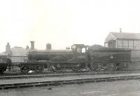 Ex-GNSR D40 4-4-0 no 62272 standing alongside the signal box at Peterhead on 4 July 1951.<br><br>[G H Robin collection by courtesy of the Mitchell Library, Glasgow 04/07/1951]