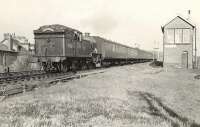 Parkhead V3 67613 passing Whiteinch West Junction on 17 April 1957 with a train for Helensburgh Central. [Ref query 4586]  <br><br>[G H Robin collection by courtesy of the Mitchell Library, Glasgow 17/04/1957]