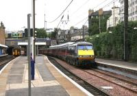 A Friday afternoon Kings Cross - Glasgow Central GNER service pulls into Haymarket platform 4 on 19 May 2006.<br><br>[John Furnevel 19/05/2006]