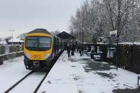 The 3-car TPE Class 185 units have been the staple traction on the Windermere branch since 2007 (replacing Class 175s that were transferred to Wales) but the new franchises in April 2016 saw this line move to Northern and some services are now being run by Class 156 Sprinters. 185146 has just arrived at Windermere and is ready to form the 1206 to Oxenholme on 17th January 2016. <br><br>[Mark Bartlett 17/01/2016]