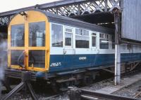 Originally Gresley chief engineer's saloon DE900580, built at Doncaster in 1936. The modified vehicle was used for a time as an observation coach on the West Highland Line where it carried the name <I>Loch Eil</I> and is seen here at Perth Carriage Sidings around 1980. The coach is now at WCRC Carnforth. [Ref query 5313] <br><br>[Bill Roberton
 //1980]