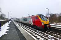 A southbound Voyager, a service diverted from the closed WCML due to the Lamington Viaduct damage, is held at the starter while an all stations service clears the section.<br><br>[Colin Miller 18/01/2016]