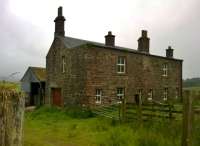 Railway workers' cottages at Saughtree, seen on a BLS visit. There seems to have been some tree clearance over the last 52 years [see image 41794]<br><br>[Ken Strachan 10/07/2015]