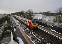 Diverted from the usual Lockerbie route, this Glasgow to Carlisle Virgin train passes Gretna Green on Monday 18 January 2016.<br><br>[Bruce McCartney 18/01/2015]