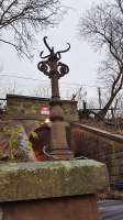 An ornate lamp-bracket remains at the Delvin Road entrance to Cathcart station.<br><br>[John Yellowlees 12/01/2016]